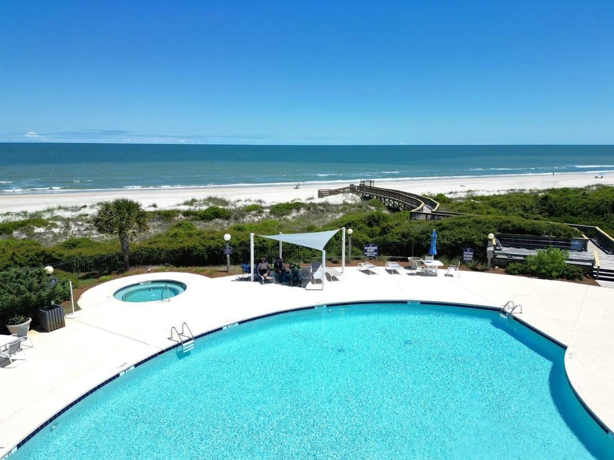 Resort pool and hot tub overlooking the beach and Atlantic Ocean near Breakers Reef, Litchfield by the Sea, SC