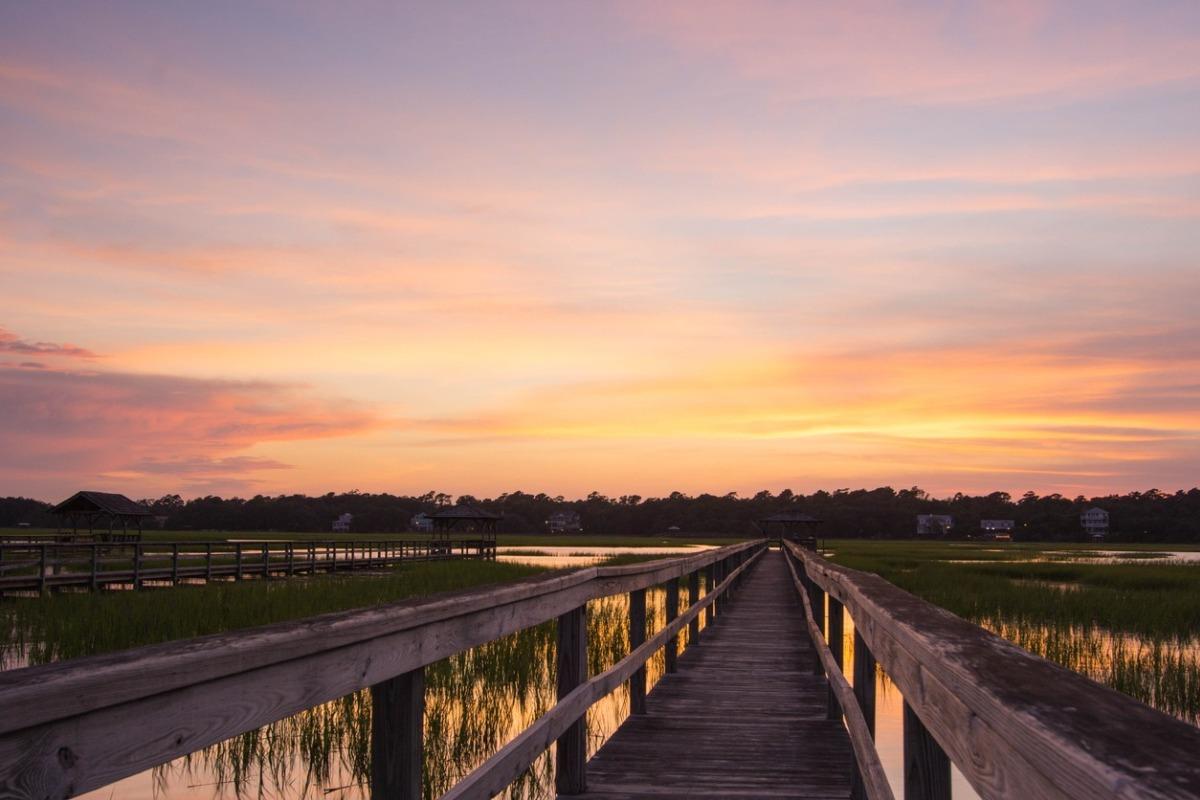 Salt Marsh with wooden boardwalk during sunset on Pawleys Island.